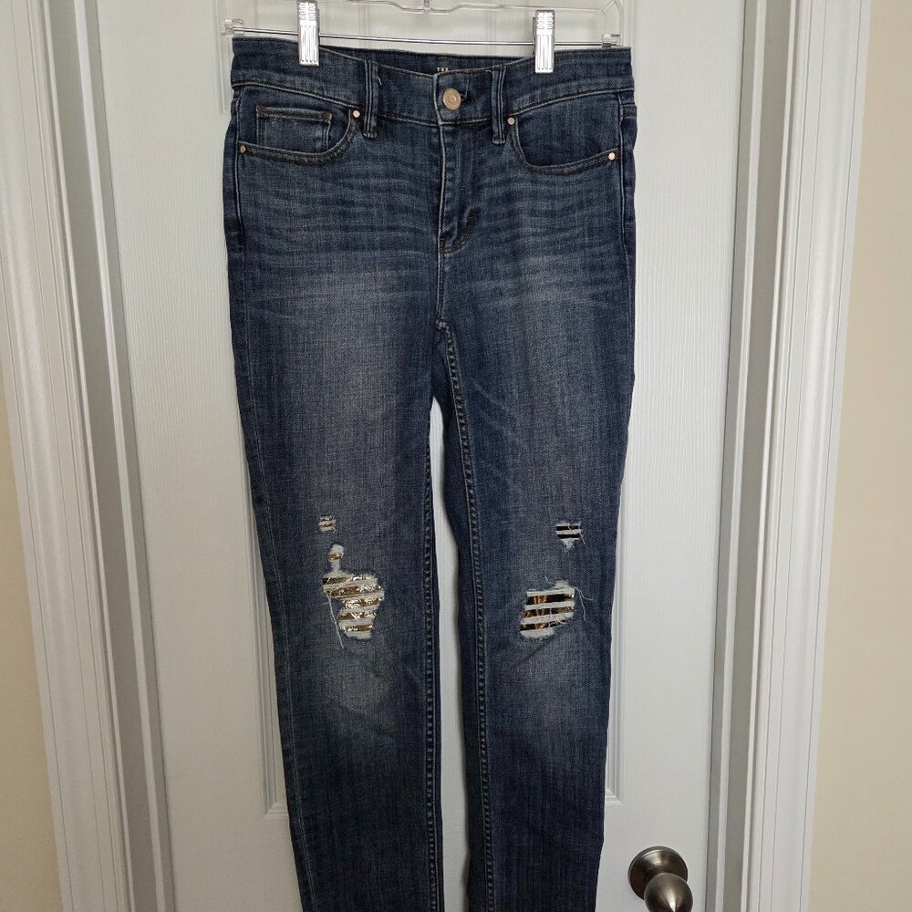 WHBM The Slim Distressed Jeans with deconstructed ankle hem.  Size 0